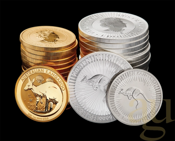 Gold- und Silbermünzen von Versicherungsmakler